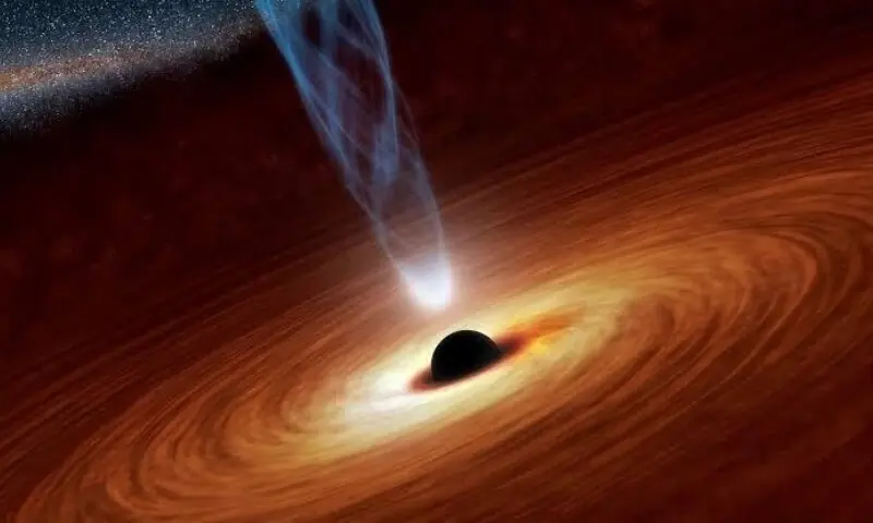 A supermassive black hole with millions to billions times the mass of our sun is seen in an undated Nasa artist's concept illustration. - Reuters