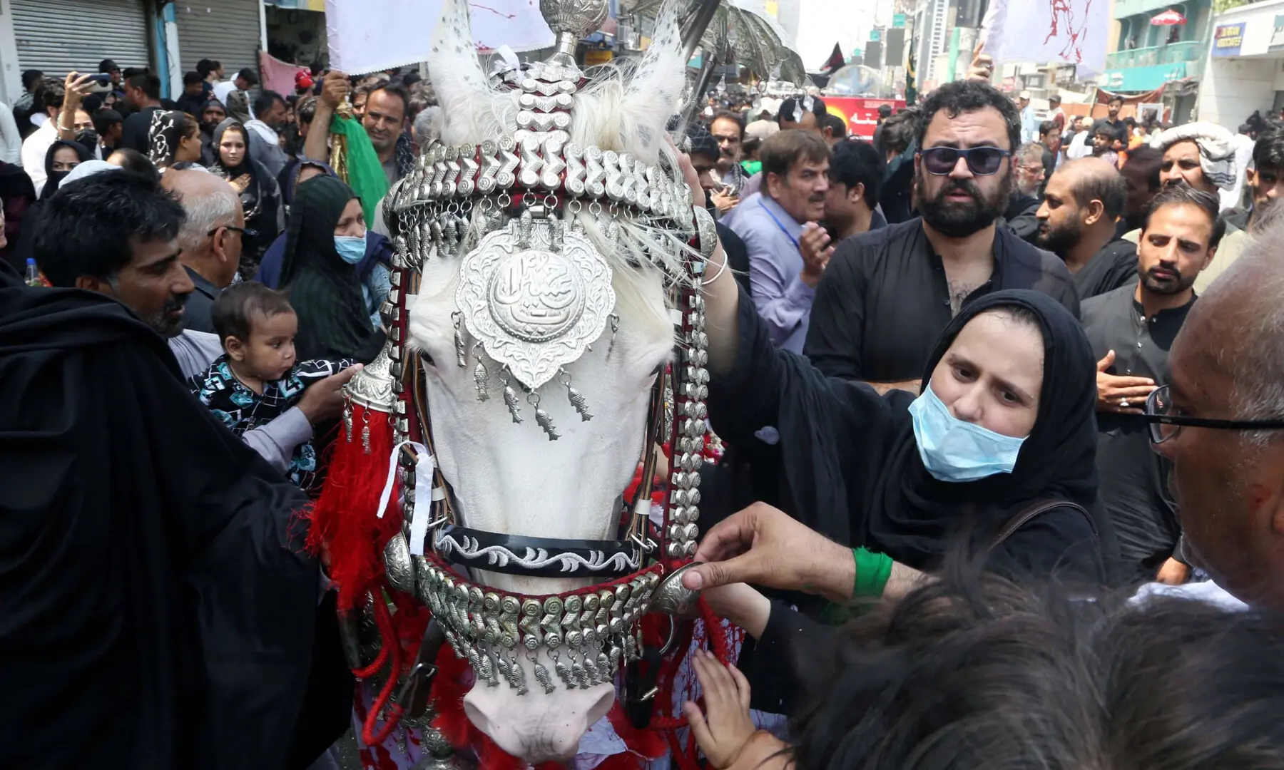 Muslims Participate in a Muharram procession on the ninth day of Ashura on Peshawar&rsquo;s Saddar Road on June 25, 2026. &mdash; PPI Images