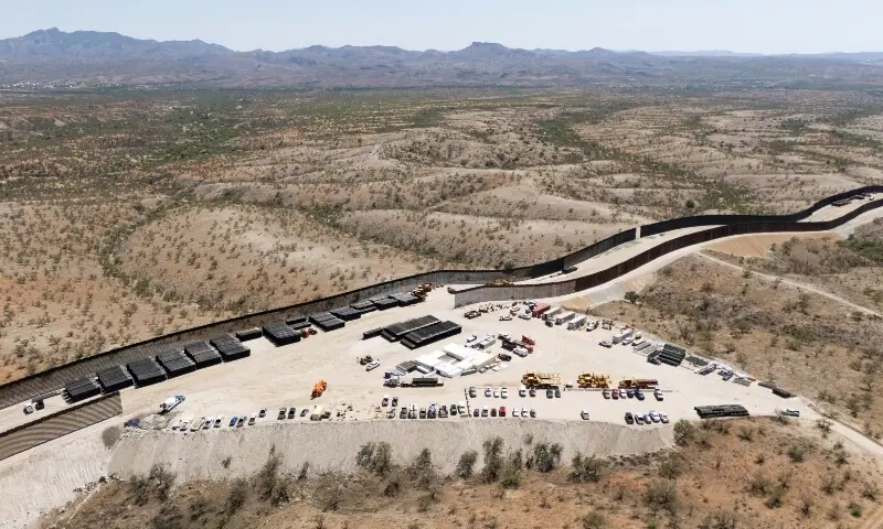 A drone view shows a construction yard from where workers are rapidly constructing a second US-Mexico border fence, east of Nogales in Kino Springs, Arizona, the US on June 24, 2026. &mdash; Reuters