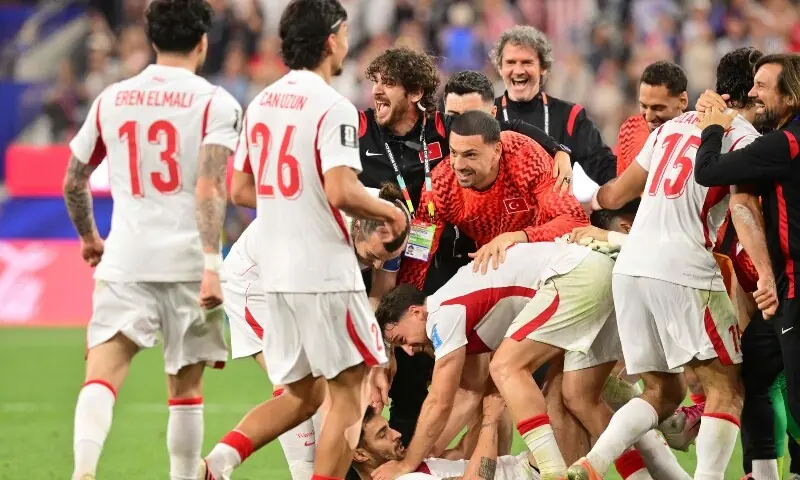 Turkiye's defender Kaan Ayhan (C) celebrates after scoring his team&rsquo;s third goal with teammates during the 2026 World Cup Group D football match between Turkiye and USA at the Los Angeles Stadium in Inglewood on June 25, 2026. &mdash; AFP