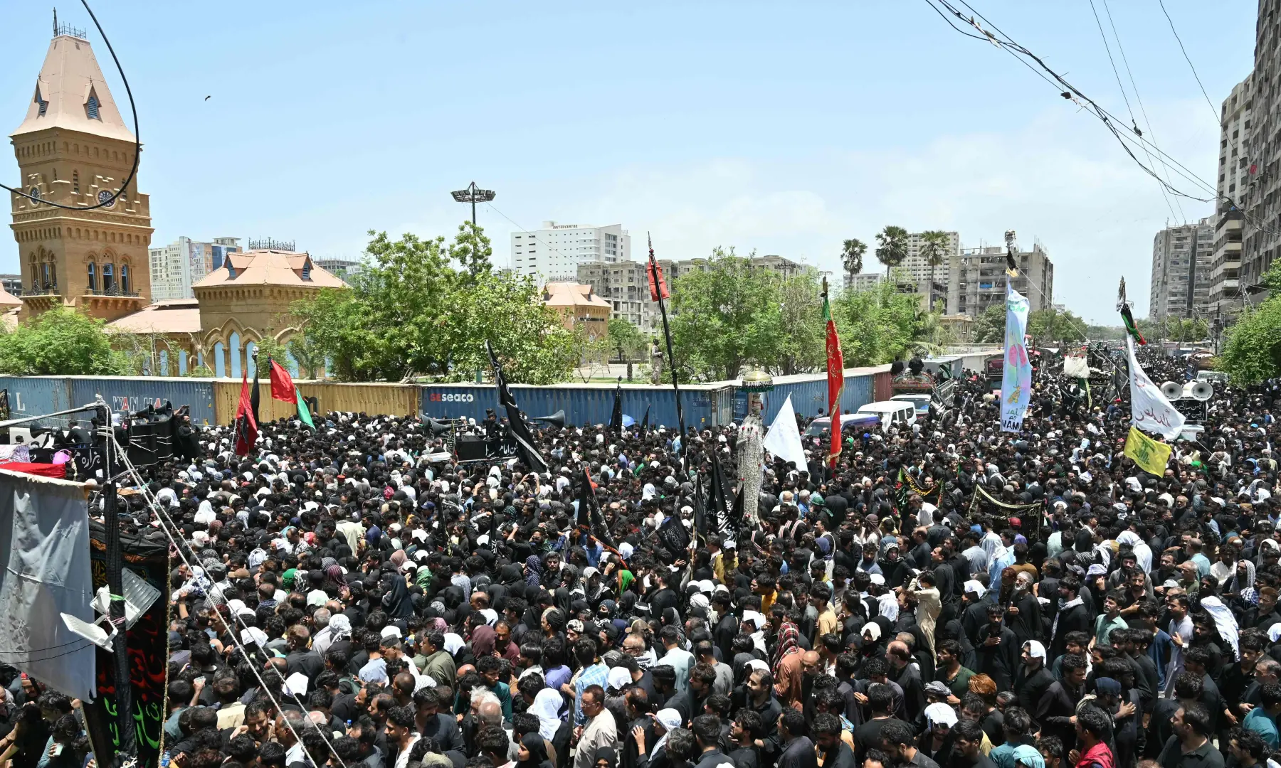 Shia Muslims march during a religious procession marking Ashura on the tenth day of Muharram in Karachi on June 26, 2026. &mdash; AFP