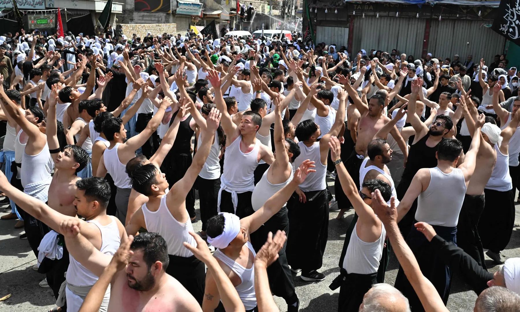 Mourners take part in the Muharram procession on the tenth day of Ashura in Quetta on June 26, 2026. &mdash; AFP