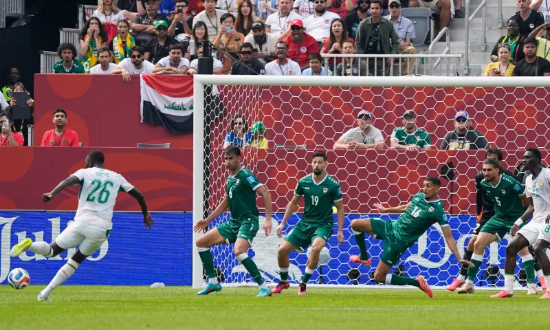 Senegal's Pape Gueye (L) scores during the 2026 FIFA World Cup Group 'I' match against Iraq at the Toronto Stadium in Toronto, Canada on June 26, 2026.--Reuters