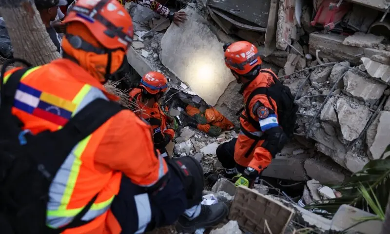 Members of the El Salvador rescue team search for survivors in the rubble of a collapsed building following an earthquake, in La Guaira, Venezuela on June 26, 2026. &mdash;Reuters/File