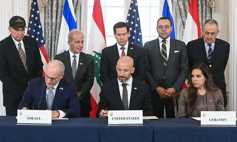 US Secretary of State Marco Rubio (C, back) looks on as (L/R, front row) Israeli Ambassador to the US Yechiel Leiter, State Department Chief of Staff Daniel Holler, and Lebanese Ambassador to the US Nada Hamadeh sign a framework agreement at the US Department of State in Washington, DC, on June 26, 2026. &mdash; AFP