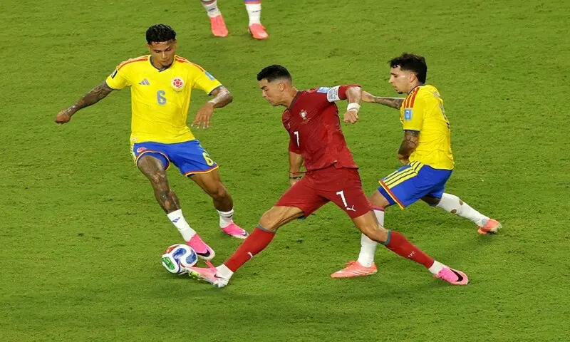 Portugal's Cristiano Ronaldo (C) vies for the ball with Colombia's Richard Rios (L) and Gustavo Puerta during their 2026 FIFA World Cup Group 'K' match at he Miami Stadium in Miami Gardens on June 28, 2026. &mdash;Reuters