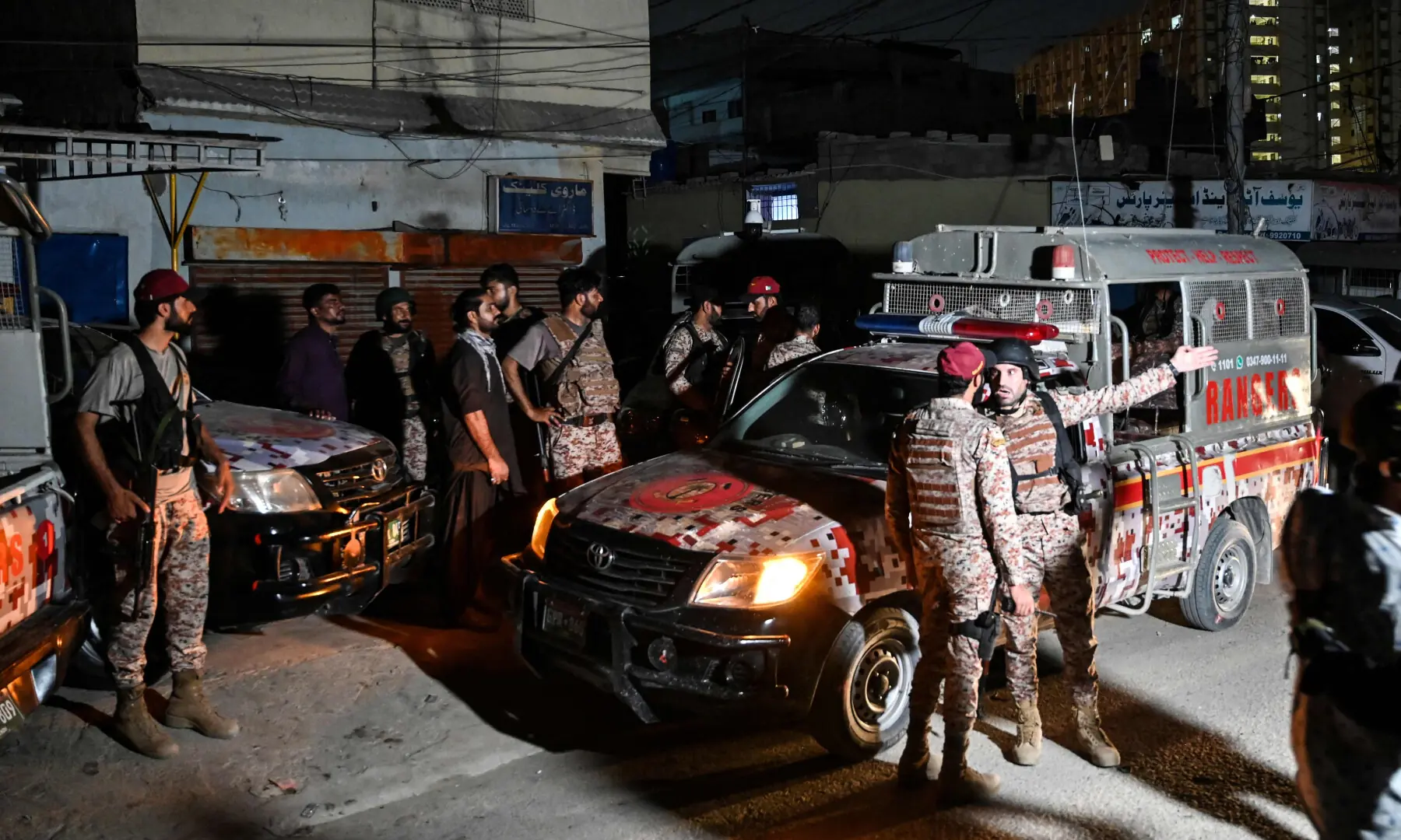 Paramilitary soldiers arrive to cordon off the streets around the Mosamiyat Chowrangi area after a terrorist attack on Rangers compound in Karachi on June 27, 2026. &mdash; AFP