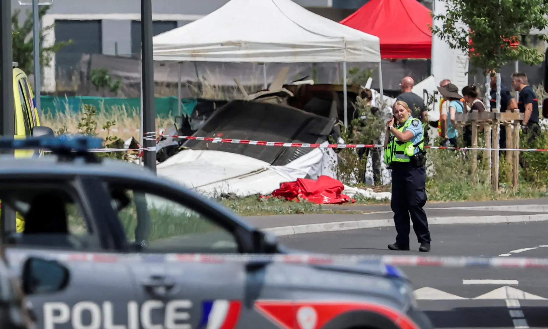 A rescuer works at the site of a plane crash in Tomblaine, France on June 28, 2026. &mdash; Reuters