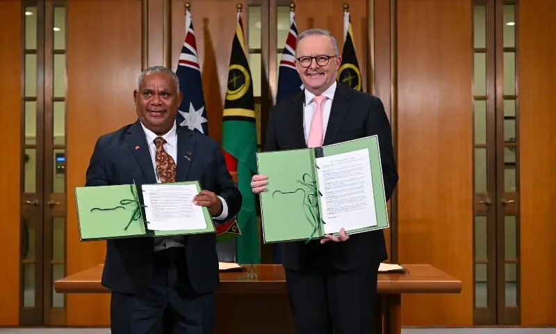 Prime Minister of Vanuatu Jotham Napat and Australian Prime Minister Anthony Albanese pose for photographs after signing the Nakamal agreement during the Australia-Vanuatu Leaders' Meeting at Parliament House in Canberra, Australia, June 29, 2026. &mdash; Reuters