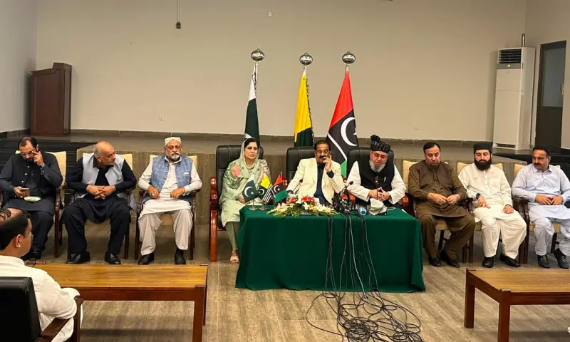 PPP and JUI-F regional leaders Chaudhry Yasin and Maulana Saeed Yousaf address a press conference at Kashmir House on Sunday to announce electoral alliance between their parties. — Photo via author PPP and JUI-F regional leaders Chaudhry Yasin and Maulana Saeed Yousaf address a press conference at Kashmir House on Sunday to announce electoral alliance between their parties. — Photo via author