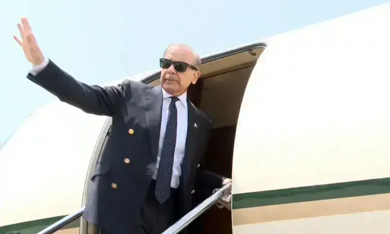 Prime Minister Shehbaz Sharif waves as he leaves for his visit to Turkiye at the Nur Khan airbase in Rawalpindi on April 22. &mdash; DawnNewsTV/File