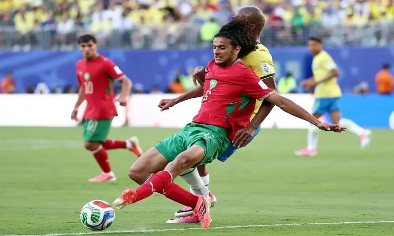 Ayyoub BouaddI in action during the 2026 FIFA World Cup Group 'C' match against Brazil at the New York New Jersey Stadium on June 14, 2026.&mdash;AFP