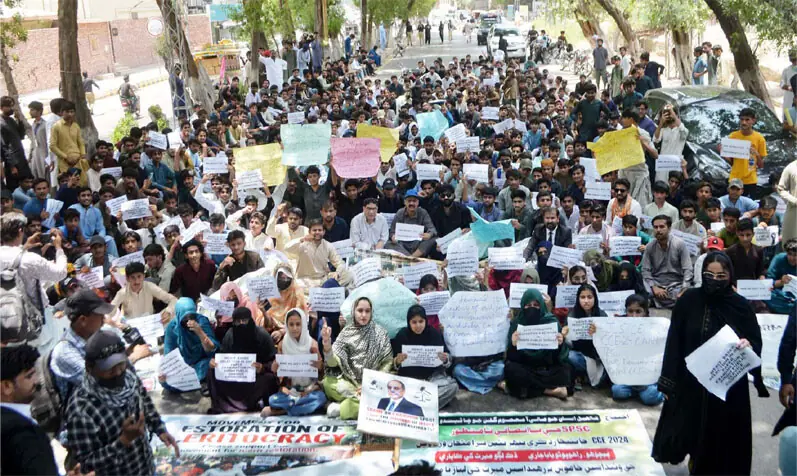 UNSUCCESSFUL candidates of CCE-24 hold a sit-in outside SPSC headquarters in Hyderabad on Monday.&mdash;Dawn