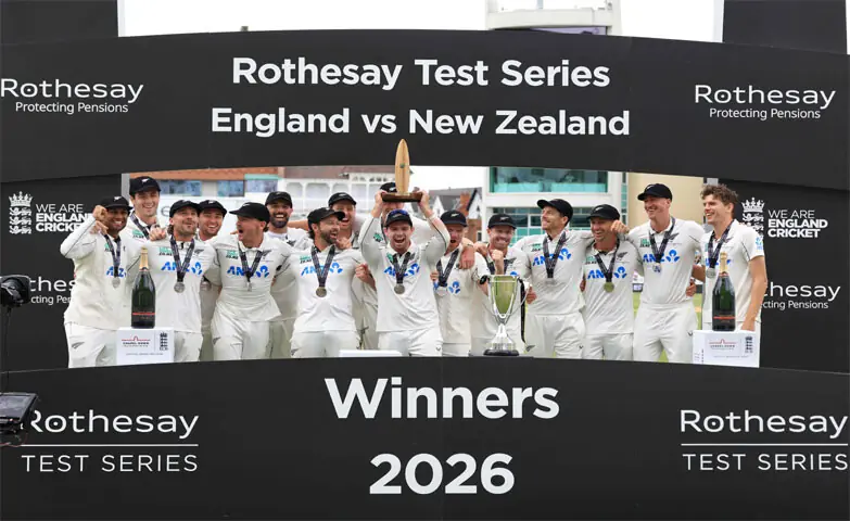 NEW ZEALAND captain Tom Latham holds the Crowe-Thorpe Trophy as he celebrates with team-mates after the third Test against England at Trent Bridge on Monday.&mdash;AFP