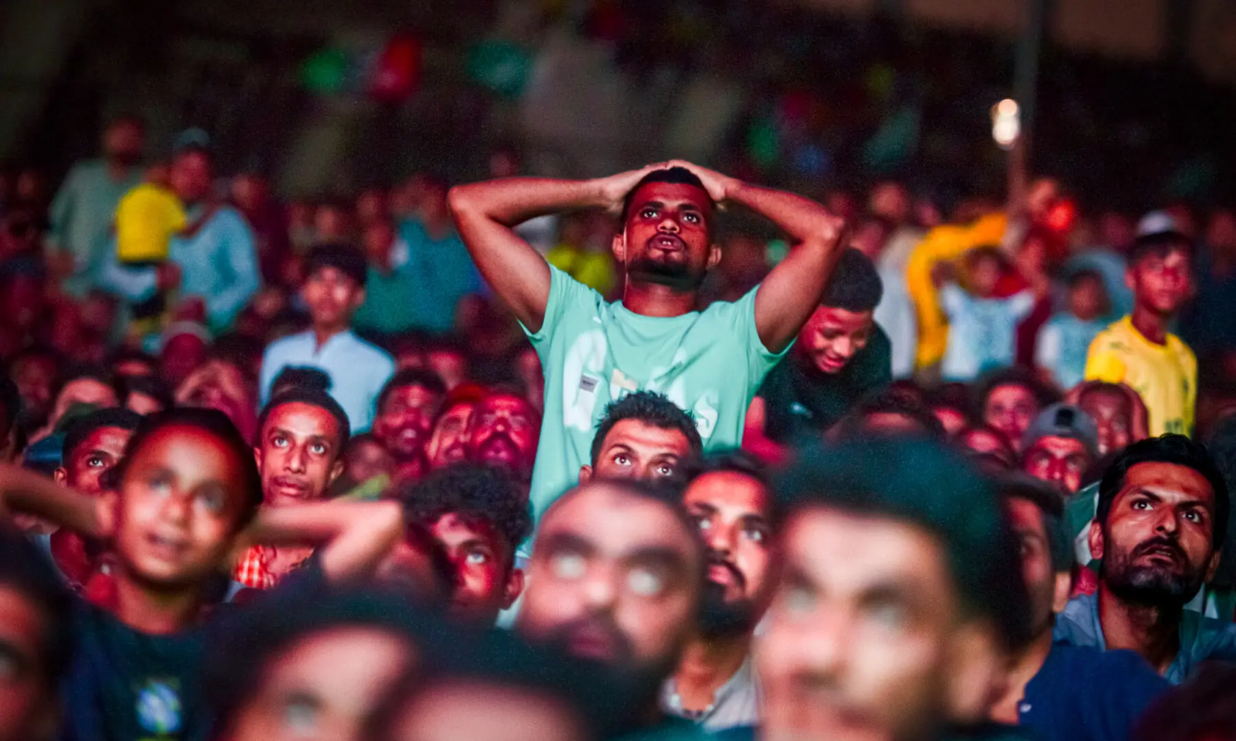 Football fans react during a screening of the FIFA World Cup match between Brazil and Japan at Lyari International Football Stadium in Karachi on June 29, 2026. &mdash; Tahir Jamal