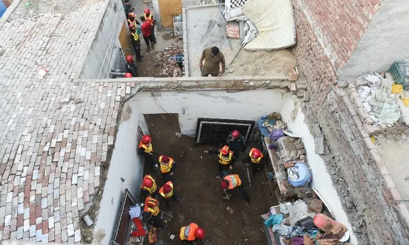 Rescue workers work at the site where children reportedly died after a tuition center roof collapsed, in Lahore on June 30, 2026. &mdash; Reuters