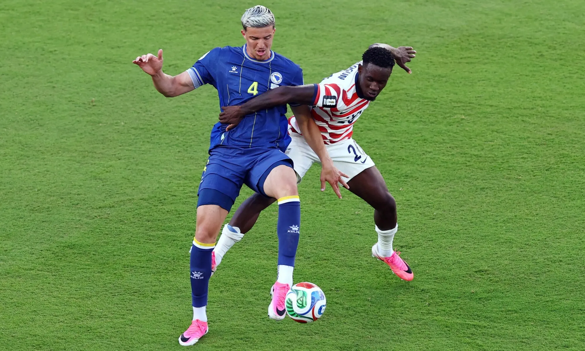 Folarin Balogun of the US fouls Bosnia and Herzegovina's Tarik Muharemovic before being shown a red card during a FIFA World Cup match in San Francisco Bay Area Stadium, Santa Clara, California on July 1. — Reuters Folarin Balogun of the US fouls Bosnia and Herzegovina's Tarik Muharemovic before being shown a red card during a FIFA World Cup match in San Francisco Bay Area Stadium, Santa Clara, California on July 1. — Reuters