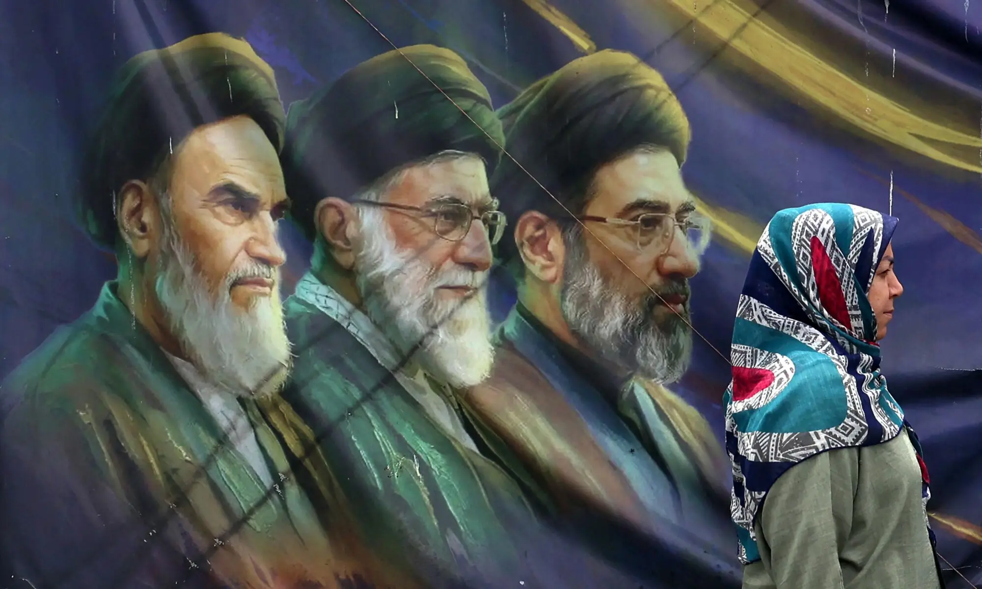 An Iranian woman walks past a banner bearing portraits of the late founder of the Islamic Republic, Ayatollah Ruhollah Khomeini (L), assassinated supreme leader Ayatollah Ali Khamenei (C) and current Supreme Leader Ayatollah Mojtaba Khamenei in Tehran on May 28, 2026. — AFP An Iranian woman walks past a banner bearing portraits of the late founder of the Islamic Republic, Ayatollah Ruhollah Khomeini (L), assassinated supreme leader Ayatollah Ali Khamenei (C) and current Supreme Leader Ayatollah Mojtaba Khamenei in Tehran on May 28, 2026. — AFP