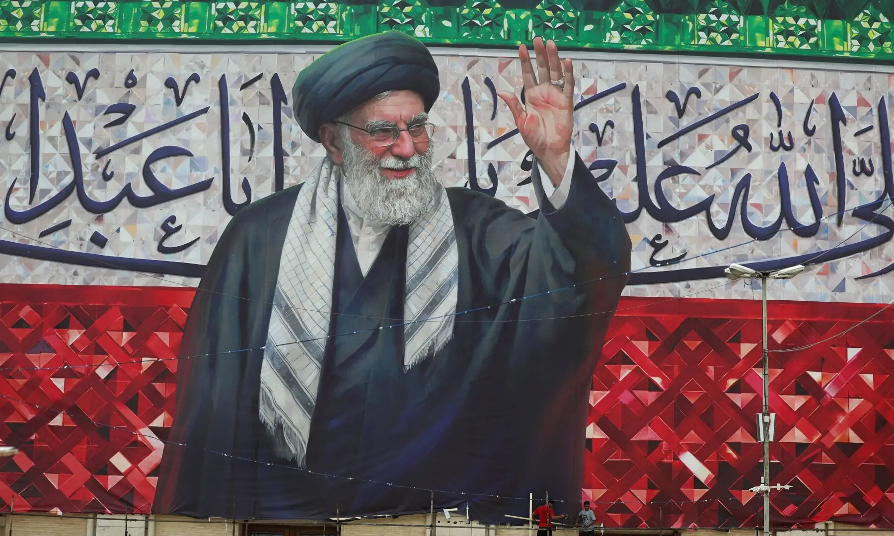 Large banner with a picture of Iran&rsquo;s assassinated Supreme Leader Ayatollah Ali Khamenei as preparations are underway for his funeral at the Imam Khomeini Grand Mosalla, in Tehran, Iran on July 2, 2026. &mdash; Reuters