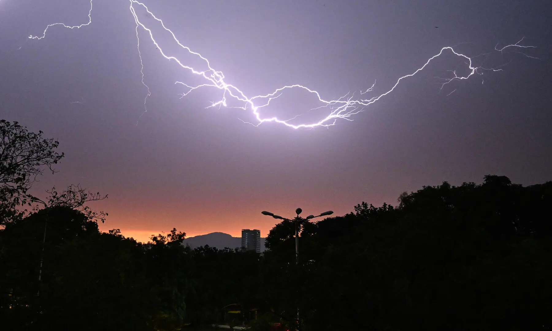 Lightning strikes during rain and thunderstorm in Islamabad on July 1, 2026. &mdash; AFP
