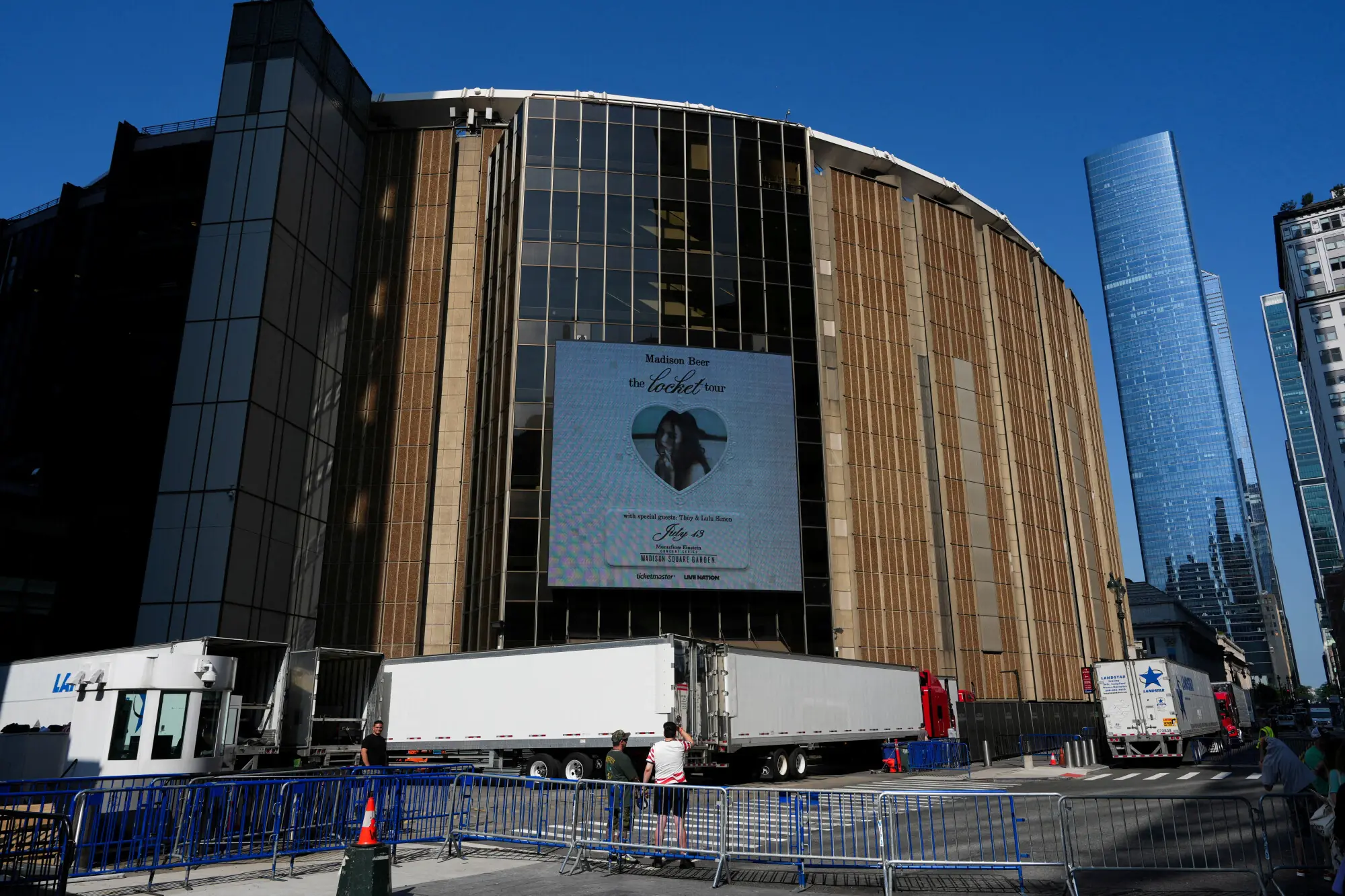 Trucks positioned to block views of the loading bay at Taylor Swift&rsquo;s rumoured wedding venue. Photo: Reuters.