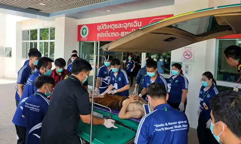 This handout photo taken and released on July 2, 2026 by Ruamjai Mukdahan Rescue Foundation shows an injured monk arriving at Mukdahan Hospital after a collision between a pickup truck driven by an 11-year old and a procession of Buddhist monks, killing eight monks and injuring more than 20 others, in the northeastern Thai province of Mukdahan. &mdash; AFP
