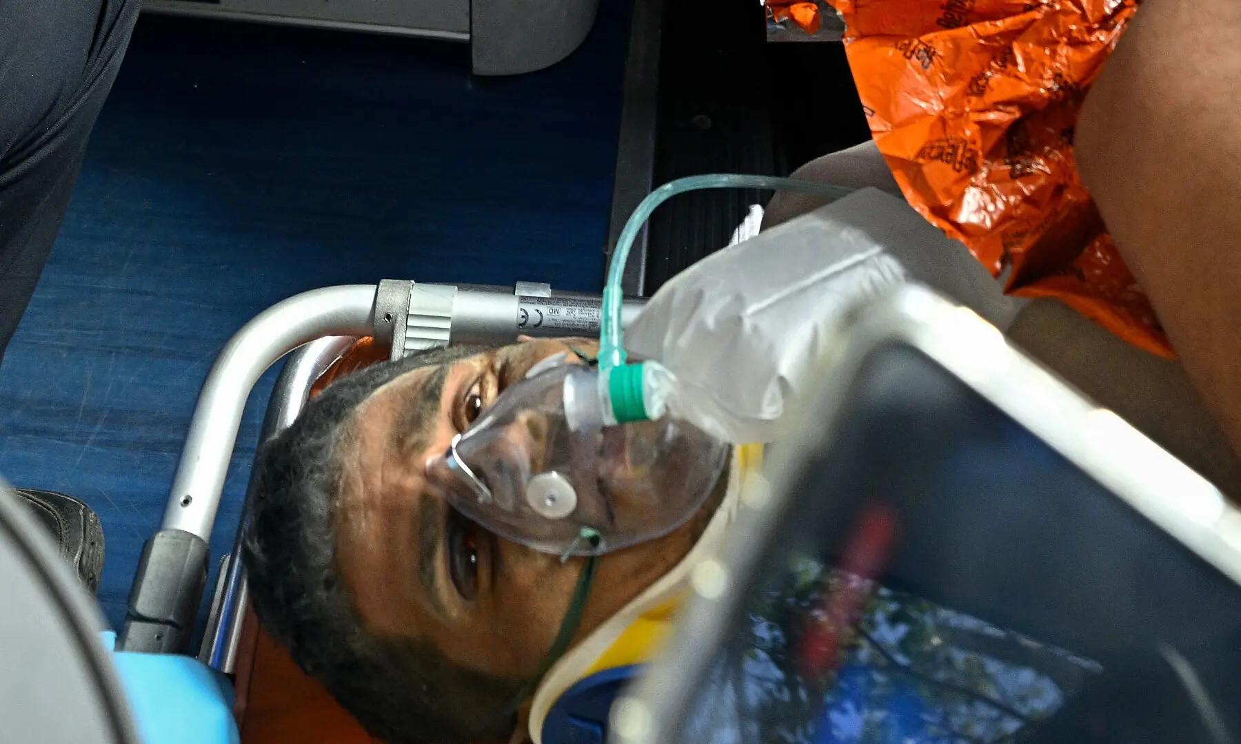 Hernan Gil, a survivor of Venezuela's twin earthquakes, is rushed into an ambulance by members of international rescue teams in Catia La Mar, La Guaira State, Venezuela on July 2, 2026, eight days after the quake. — AFP Hernan Gil, a survivor of Venezuela's twin earthquakes, is rushed into an ambulance by members of international rescue teams in Catia La Mar, La Guaira State, Venezuela on July 2, 2026, eight days after the quake. — AFP