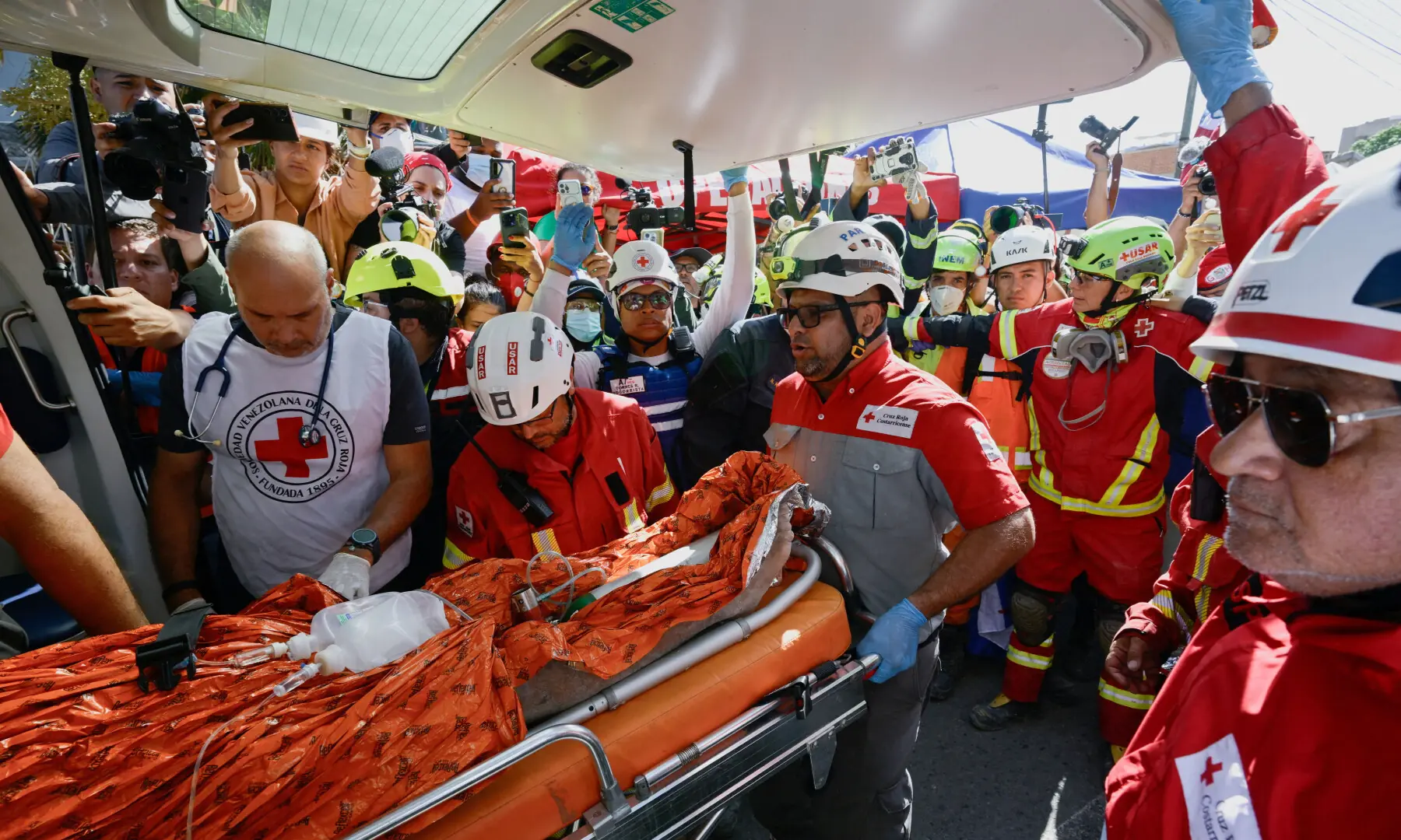Rescue workers transport survivor Hernan Alberto Gil, who was trapped for over a week at a collapsed mall following June 24 earthquakes, in La Guaira, Venezuela, on July 2, 2026. — Reuters Rescue workers transport survivor Hernan Alberto Gil, who was trapped for over a week at a collapsed mall following June 24 earthquakes, in La Guaira, Venezuela, on July 2, 2026. — Reuters