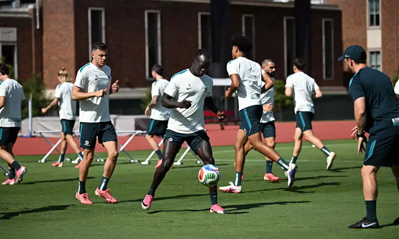 DALLAS (Texas): Australia’s Awer Mabil (C) takes part in a practice session on Thursday.—AFP DALLAS (Texas): Australia’s Awer Mabil (C) takes part in a practice session on Thursday.—AFP
