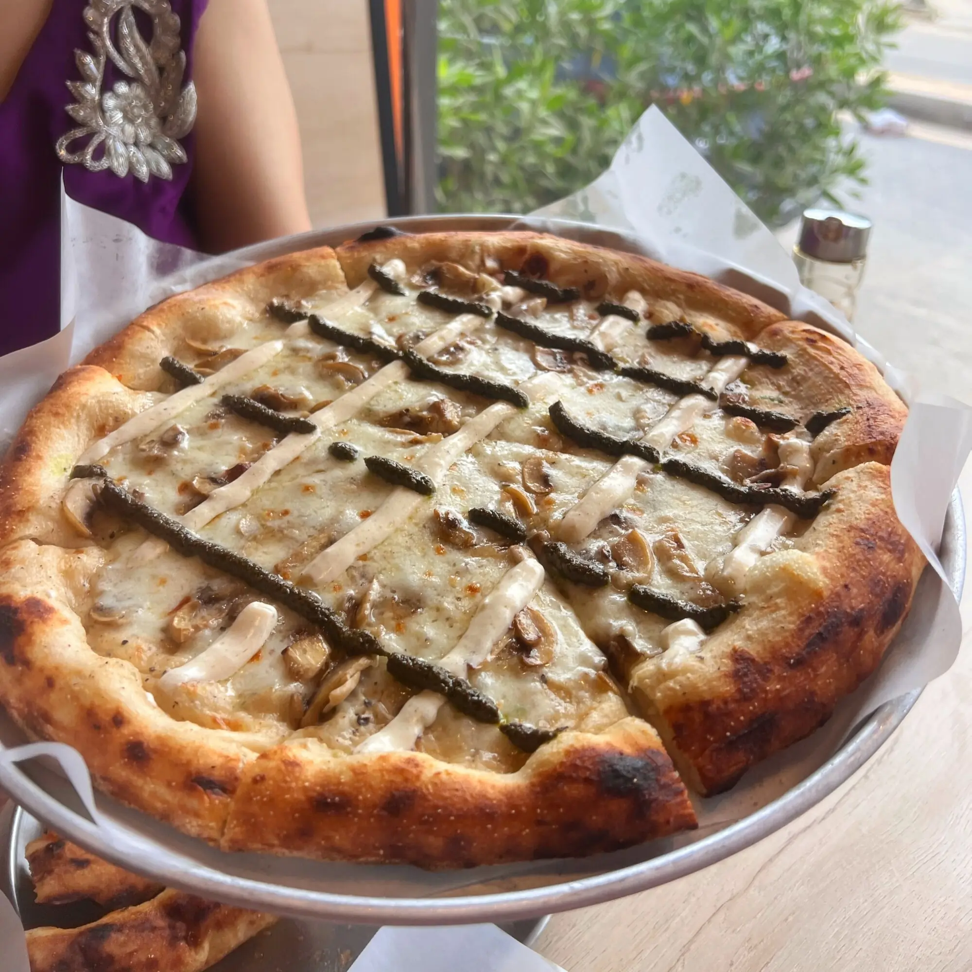 Mushroom, ricotta and pesto pizza.