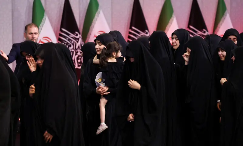 Women gather near the coffins of Iran&rsquo;s late Supreme Leader Ayatollah Ali Khamenei and his family members, as international delegates participate in a farewell ceremony for Khamenei, at the Imam Khomeini Grand Mosalla in Tehran, Iran on July 3, 2026. &mdash; Reuters