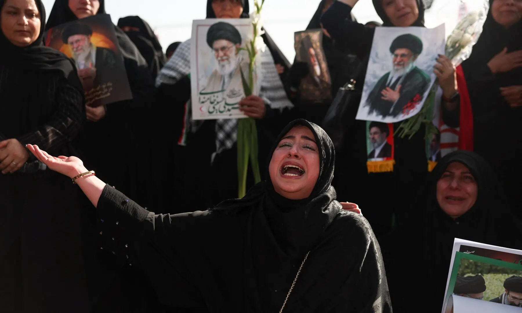 A woman reacts as mourners gather on the day of a public farewell ceremony to pay their respects to assassinated Supreme Leader Khamenei at the Imam Khomeini Grand Mosalla, in Tehran, Iran July 4, 2026. &mdash; Reuters