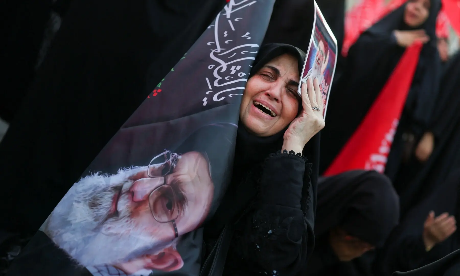 Mourners react during a public farewell ceremony to pay their respects to late Supreme Leader Ayatollah Ali Khamenei, who was killed on February 28 in Israeli and US airstrikes, at the Imam Khomeini Grand Mosalla, in Tehran, Iran on July 4, 2026. &mdash; Reuters