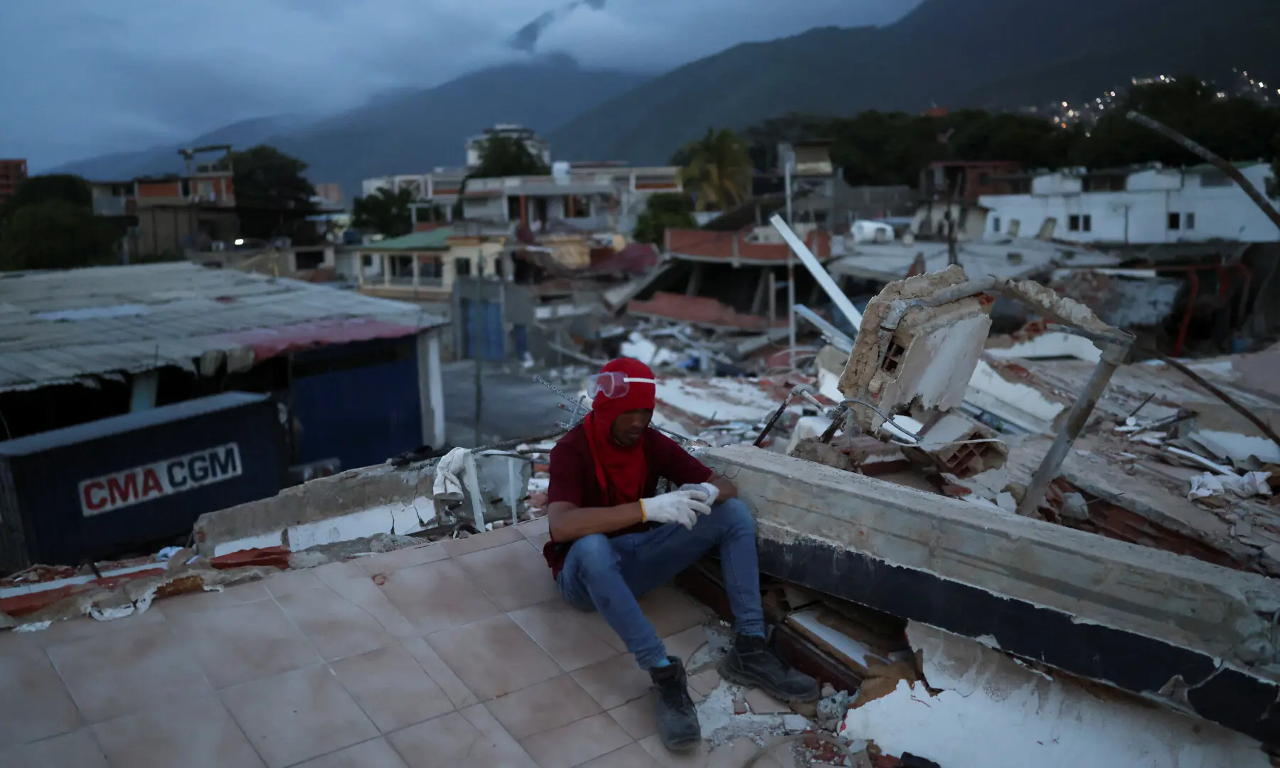 A rescuer sits atop rubble amid rescue operations in the aftermath of the June 24 earthquakes, in La Guaira, Venezuela, on July 4, 2026. — Reuters A rescuer sits atop rubble amid rescue operations in the aftermath of the June 24 earthquakes, in La Guaira, Venezuela, on July 4, 2026. — Reuters