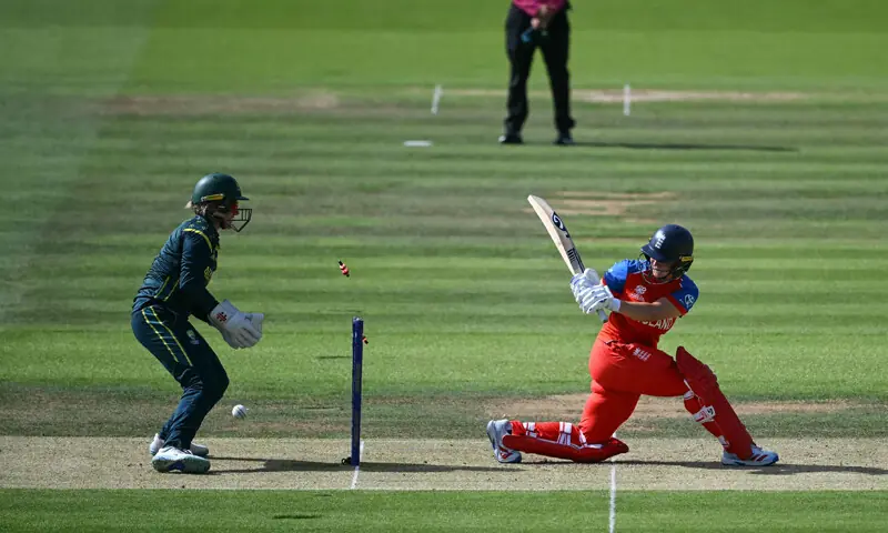 ENGLAND batter Alice Capsey is cleaned up by Australian captain Sophie Molineux as wicket-keeper Beth Mooney reacts during the Women’s T20 World Cup final at Lord’s on Sunday.—AFP ENGLAND batter Alice Capsey is cleaned up by Australian captain Sophie Molineux as wicket-keeper Beth Mooney reacts during the Women’s T20 World Cup final at Lord’s on Sunday.—AFP