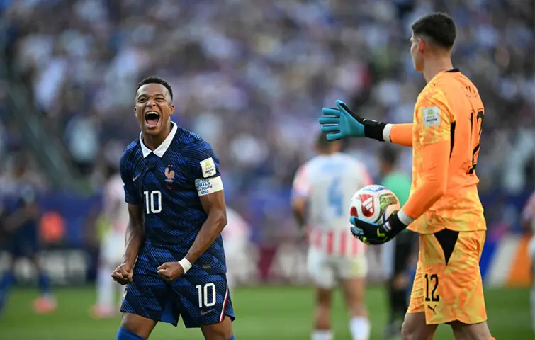 PHILADELPHIA: France’s Kylian Mbappe celebrates besides Paraguay goalkeeper Orlando Gill after winning the round-of-16 match at the Philadelphia Stadium.—AFP PHILADELPHIA: France’s Kylian Mbappe celebrates besides Paraguay goalkeeper Orlando Gill after winning the round-of-16 match at the Philadelphia Stadium.—AFP