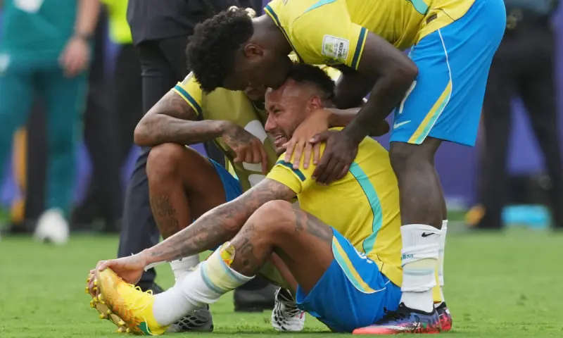 Brazil's Neymar Jr. looks dejected and is comforted by teammates after the match as Brazil are eliminated from the World Cup by Norway, July 5, 2026, New Jersey. &mdash; Reuters
