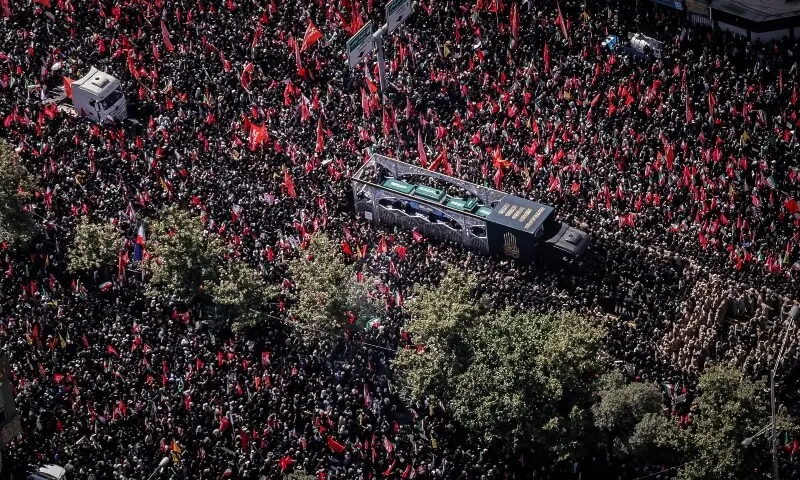 A vehicle carrying coffins of Iran's late Supreme Leader Ayatollah Ali Khamenei and his family members, makes its way as people attend a funeral procession for assassinated supreme leader Ayatollah Ali Khamenei in Tehran, Iran July 6, 2026. &mdash; Reuters