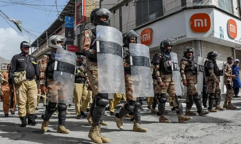 In this file photo, security personnel patrol a street during a procession on the seventh day of Muharram in Quetta.—AFP/File In this file photo, security personnel patrol a street during a procession on the seventh day of Muharram in Quetta.—AFP/File