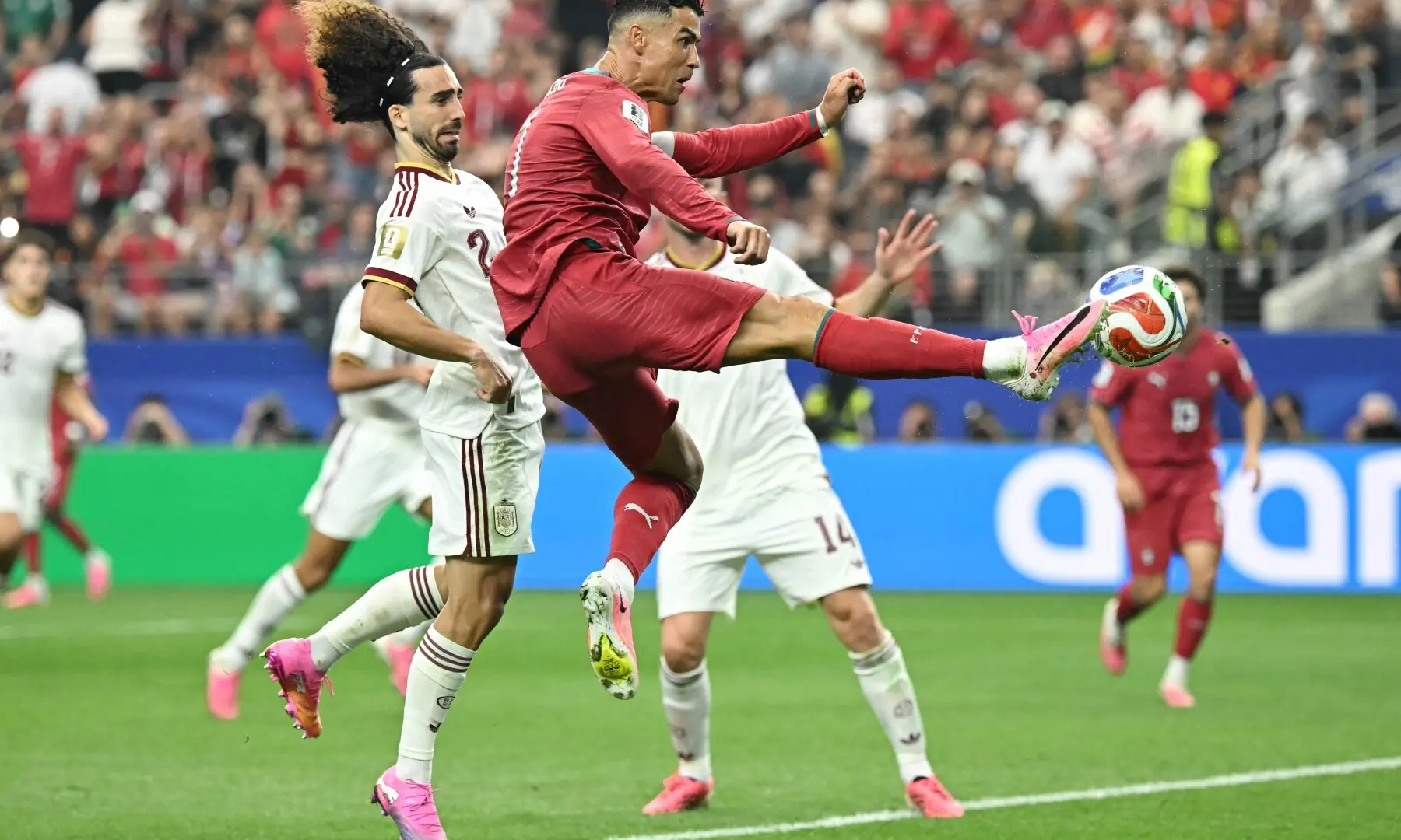 Portugal’s forward 07 Cristiano Ronaldo controls the ball next to Spain’s defender 24 Marc Cucurella during the 2026 World Cup round of 16 football match between Portugal and Spain at the Dallas Stadium in Arlington on July 6, 2026. —AFP
