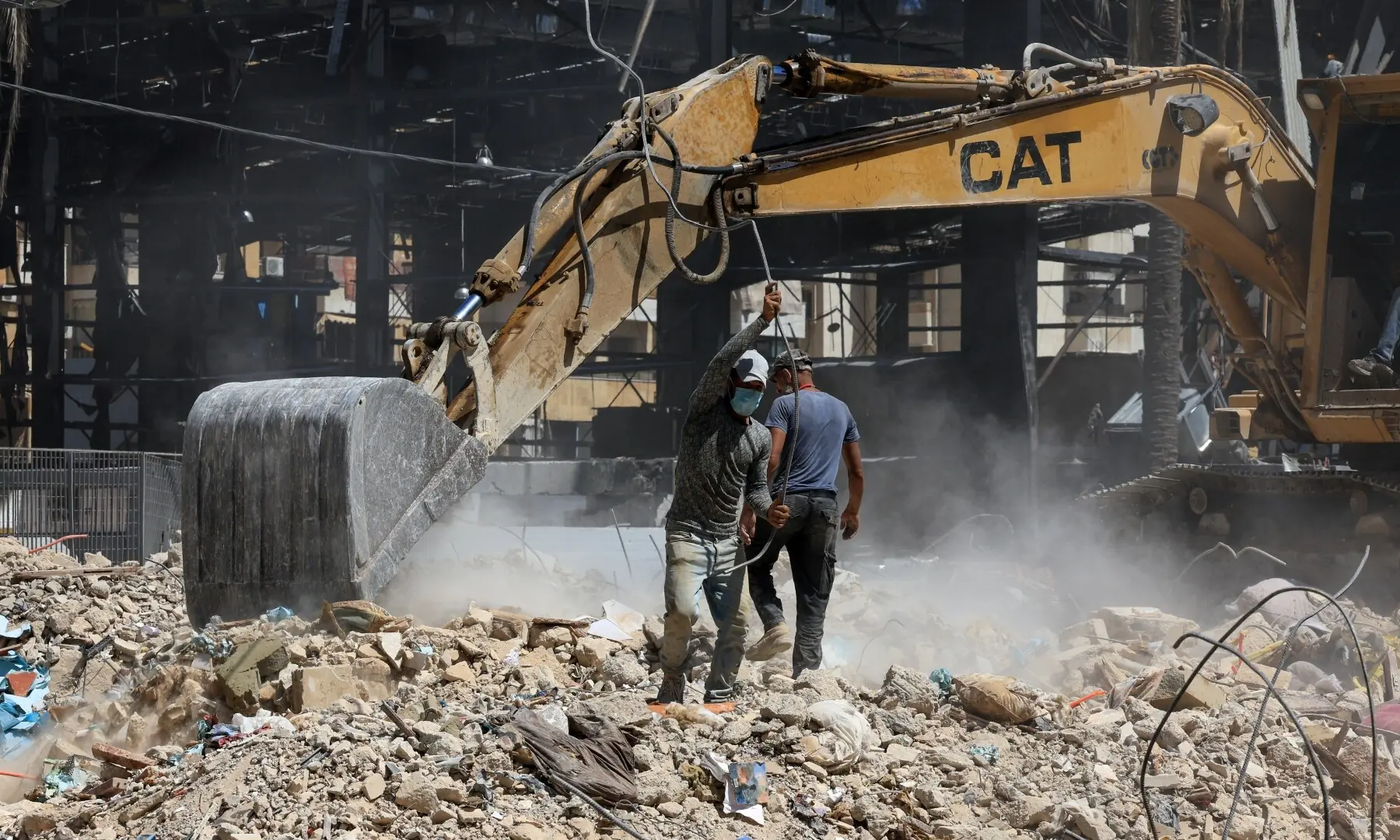 Workers clear the rubble of buildings destroyed in Israeli strikes in Beirut&rsquo;s southern suburbs, following a ceasefire agreement between Lebanon and Israel, in Beirut, Lebanon, July 6, 2026. &mdash; Reuters