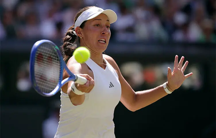 JESSICA Pegula of the US hits a return against compatriot Coco Gauff during their Wimbledon quarter-final at the All England Lawn Tennis and Croquet Club on Tuesday.—Reuters JESSICA Pegula of the US hits a return against compatriot Coco Gauff during their Wimbledon quarter-final at the All England Lawn Tennis and Croquet Club on Tuesday.—Reuters