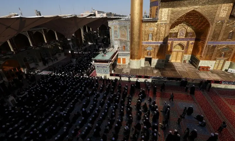 People gather on the day of a funeral procession for Iran&rsquo;s late Supreme Leader Ayatollah Ali Khamenei, who was killed on February 28 in Israeli and US airstrikes, at the Imam Ali Shrine in Najaf, Iraq, July 8, 2026. &mdash;AFP