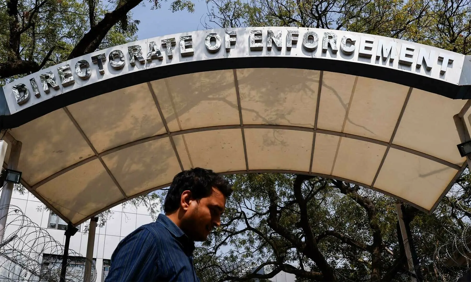 A man walks past the office of Directorate of Enforcement in New Delhi, India on March 13, 2024.—Reuters/File A man walks past the office of Directorate of Enforcement in New Delhi, India on March 13, 2024.—Reuters/File