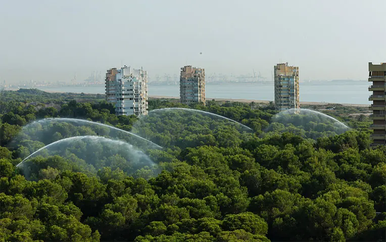 Valencia: Firefighting water cannons are activated in a national park amid an extreme heat alert in Spain.&mdash;Reuters