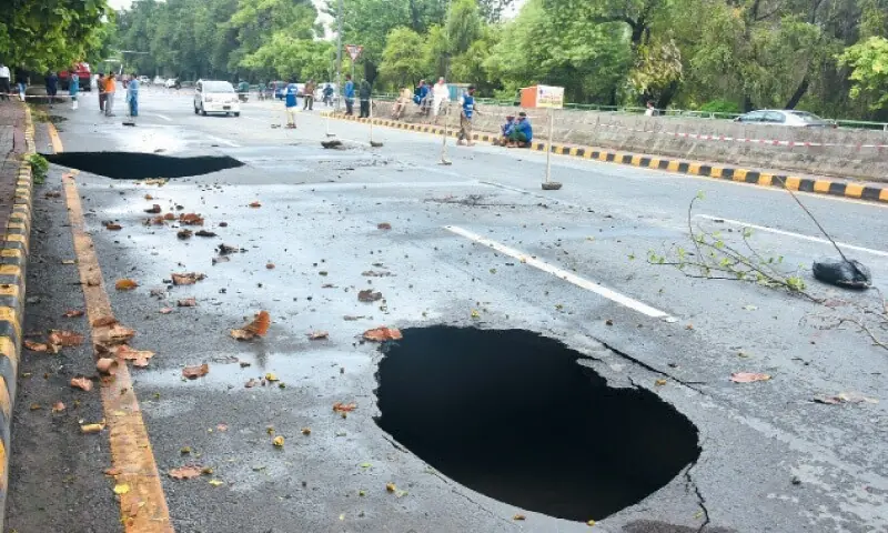 Sinkholes appear on the Canal Road near Muslim Town, Lahore during the downpour in July 2023. —White Star/File Sinkholes appear on the Canal Road near Muslim Town, Lahore during the downpour in July 2023. —White Star/File
