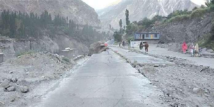 A glacial lake outburst flood destroys several link roads, besides a portion of the Karakoram Highway in Hunza. &mdash;Dawn/File