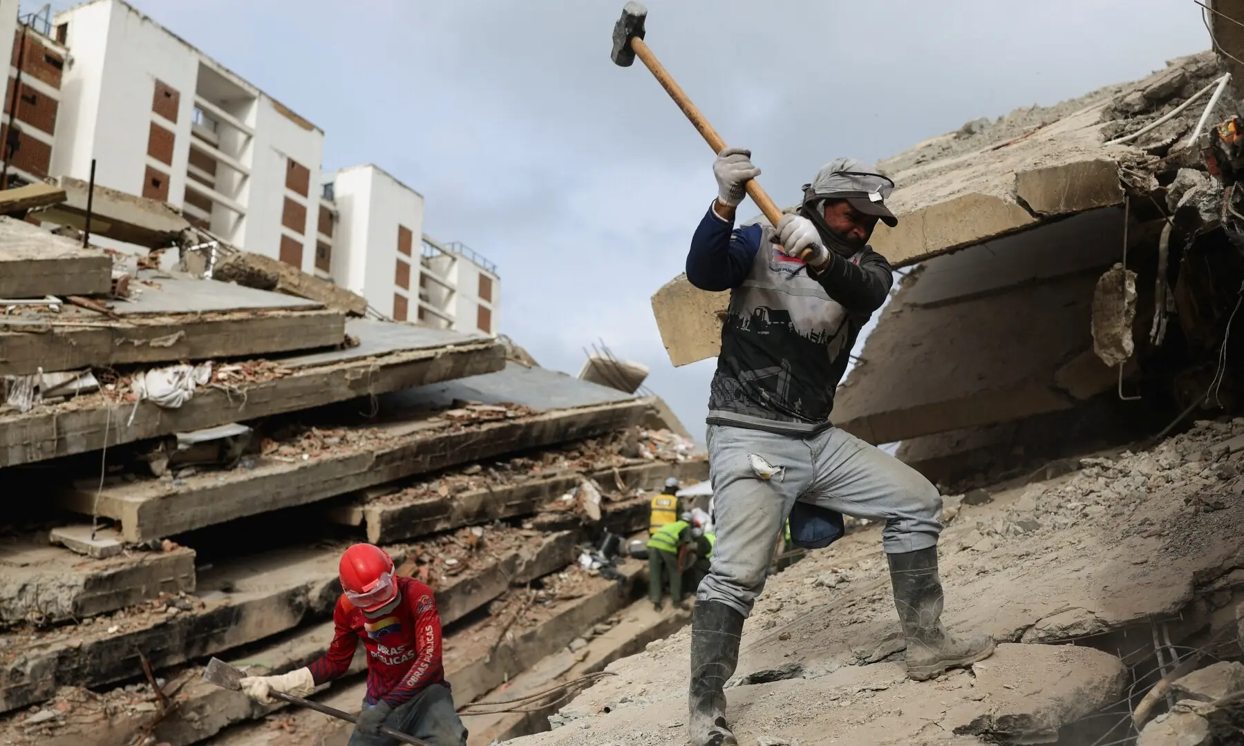 Rescuers work atop the rubble of a collapsed building following the June 24 earthquakes, in La Guaira, Venezuela, July 10, 2026. — Reuters