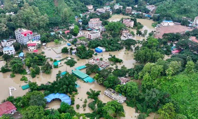This aerial photograph shows partially submerged residential buildings following heavy rains in Bangladesh's Bandarban town on July 11, 2026. — AFP This aerial photograph shows partially submerged residential buildings following heavy rains in Bangladesh's Bandarban town on July 11, 2026. — AFP