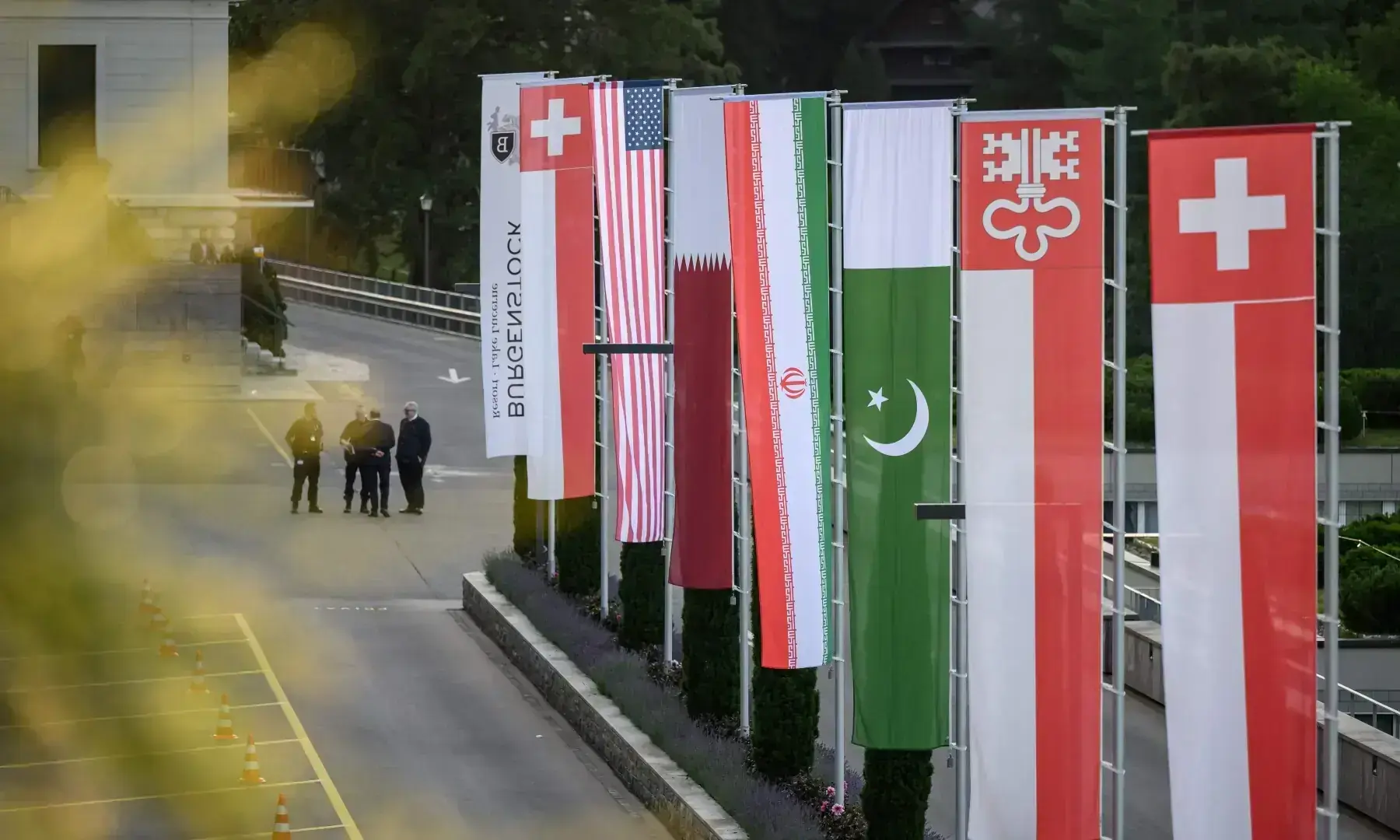 Flags of Switzerland, United States, Qatar, Pakistan and local Swiss canton of Nidwalden are photographed at the Burgenstock luxury hotel complex overlooking Lake Lucerne, Switzerland, on June 21. &mdash; AFP/File